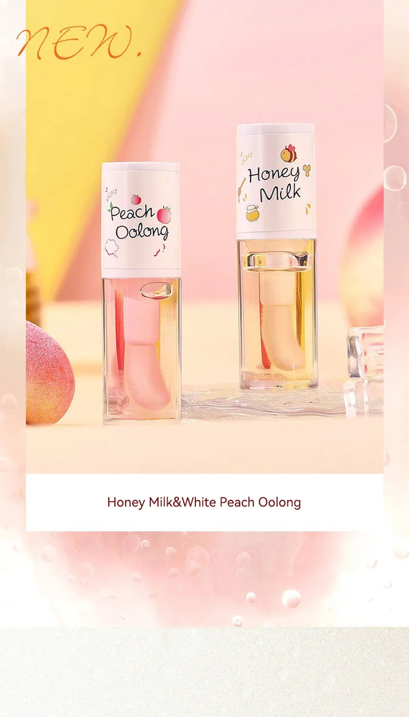 The Peach Milk Honey Lip Oil effectively alleviates dryness, provides deep moisturization, diminishes the appearance of lip lines, and imparts a light, hydrated feel to the lips. It is designed with an oversized brush head and features an appealing aesth.