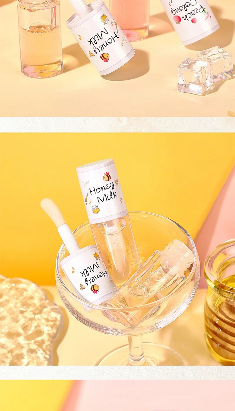 The Peach Milk Honey Lip Oil effectively alleviates dryness, provides deep moisturization, diminishes the appearance of lip lines, and imparts a light, hydrated feel to the lips. It is designed with an oversized brush head and features an appealing aesth.