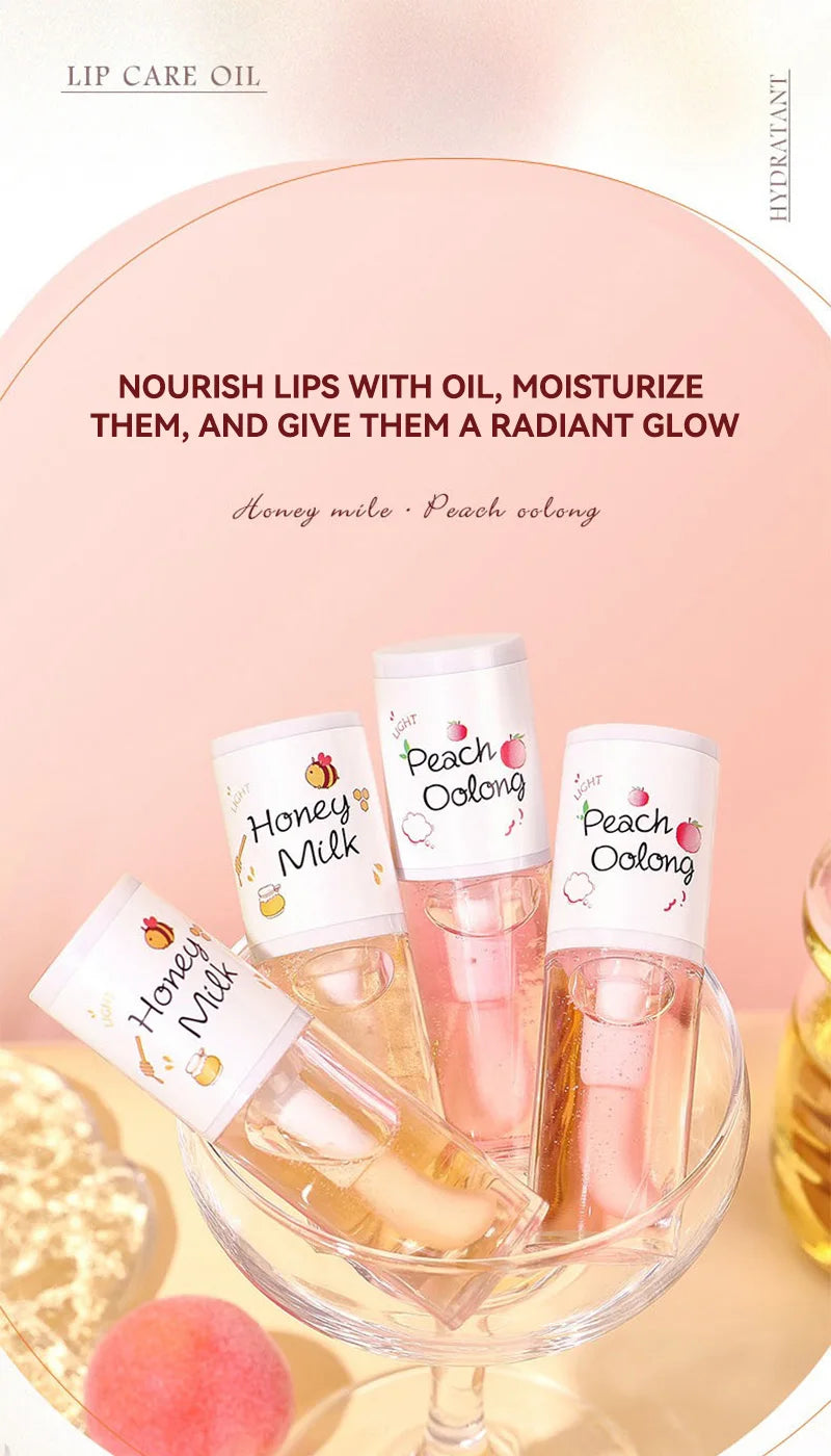 The Peach Milk Honey Lip Oil effectively alleviates dryness, provides deep moisturization, diminishes the appearance of lip lines, and imparts a light, hydrated feel to the lips. It is designed with an oversized brush head and features an appealing aesth.