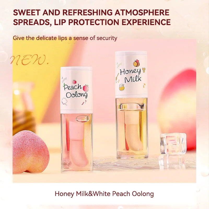 The Peach Milk Honey Lip Oil effectively alleviates dryness, provides deep moisturization, diminishes the appearance of lip lines, and imparts a light, hydrated feel to the lips. It is designed with an oversized brush head and features an appealing aesth.
