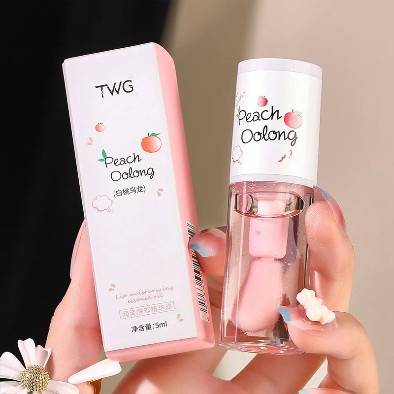 The Peach Milk Honey Lip Oil effectively alleviates dryness, provides deep moisturization, diminishes the appearance of lip lines, and imparts a light, hydrated feel to the lips. It is designed with an oversized brush head and features an appealing aesth.