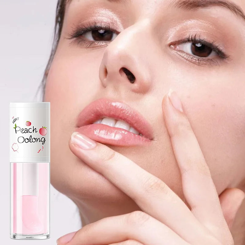 The Peach Milk Honey Lip Oil effectively alleviates dryness, provides deep moisturization, diminishes the appearance of lip lines, and imparts a light, hydrated feel to the lips. It is designed with an oversized brush head and features an appealing aesth.
